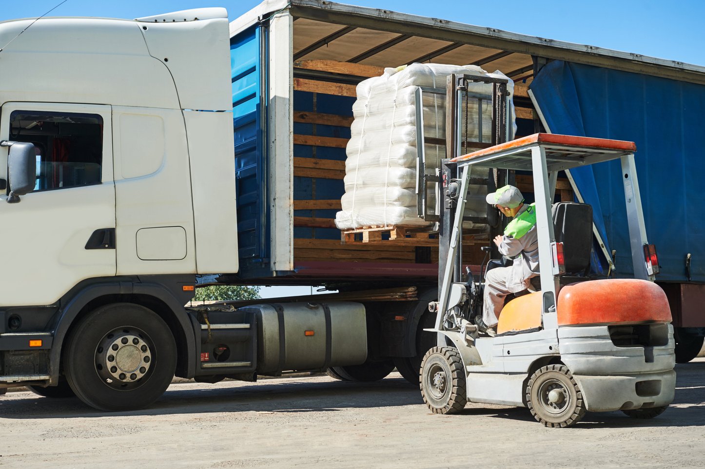 Forklift with Load and Lorry Truck